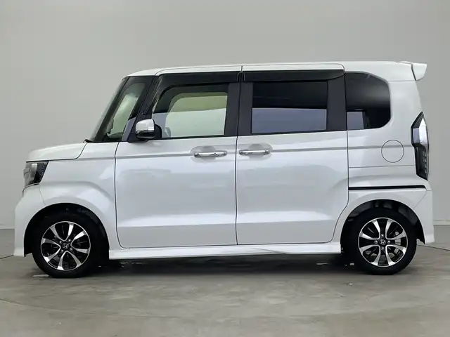 ホンダ Ｎ ＢＯＸ カスタム G L ホンダセンシング 新潟県 2019(令1)年 6.5万km プラチナホワイトパール ストラーダメモリナビ【CN-RE06D】/　TV/Bluetooth/CD/DVD/衝突被害軽減ブレーキ/レーンキープアシスト/後方コーナーセンサー/前席シートヒーター/片側パワースライドドア/ドライブレコーダー/ビルトインETC/バックモニター/アイドリングストップ/横滑り防止装置/LEDヘッドライト/オートマチックハイビーム/オートライト/禁煙車