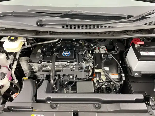 トヨタ ヴォクシー ハイブリッド S－Z 愛知県 2022(令4)年 4.5万km グリッターブラックガラスフレーク 禁煙車/純正10.5インチナビ/（AM/FM/Bluetooth/フルセグTV/USB/HDMI)/バックカメラ/トヨタセーフティセンス/・プリクラッシュセーフティ/・レーンディパーチャーアラート/・レーントレーシングアシスト/・オートマチックハイビーム/・レーダークルーズコントロール/ETC2.0/AC100V電源/オットマン/シートヒーター/両側パワースライドドア/パワーバックドア/純正17インチアルミホイール/LEDヘッドライト/フロントフォグランプ/スマートキー/プッシュスタート/スペアキー/純正フロアマット/横滑り防止装置/