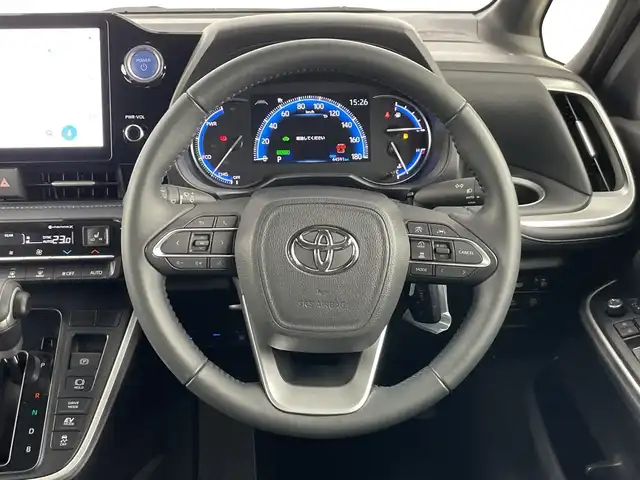 トヨタ ヴォクシー ハイブリッド S－Z 愛知県 2022(令4)年 4.5万km グリッターブラックガラスフレーク 禁煙車/純正10.5インチナビ/（AM/FM/Bluetooth/フルセグTV/USB/HDMI)/バックカメラ/トヨタセーフティセンス/・プリクラッシュセーフティ/・レーンディパーチャーアラート/・レーントレーシングアシスト/・オートマチックハイビーム/・レーダークルーズコントロール/ETC2.0/AC100V電源/オットマン/シートヒーター/両側パワースライドドア/パワーバックドア/純正17インチアルミホイール/LEDヘッドライト/フロントフォグランプ/スマートキー/プッシュスタート/スペアキー/純正フロアマット/横滑り防止装置/