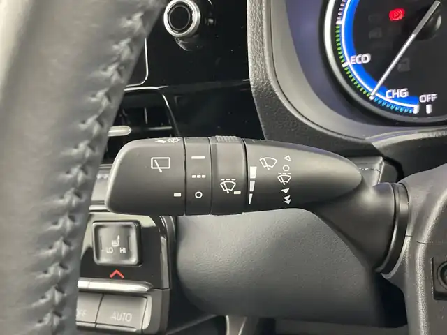 トヨタ ヴォクシー ハイブリッド S－Z 愛知県 2022(令4)年 4.5万km グリッターブラックガラスフレーク 禁煙車/純正10.5インチナビ/（AM/FM/Bluetooth/フルセグTV/USB/HDMI)/バックカメラ/トヨタセーフティセンス/・プリクラッシュセーフティ/・レーンディパーチャーアラート/・レーントレーシングアシスト/・オートマチックハイビーム/・レーダークルーズコントロール/ETC2.0/AC100V電源/オットマン/シートヒーター/両側パワースライドドア/パワーバックドア/純正17インチアルミホイール/LEDヘッドライト/フロントフォグランプ/スマートキー/プッシュスタート/スペアキー/純正フロアマット/横滑り防止装置/