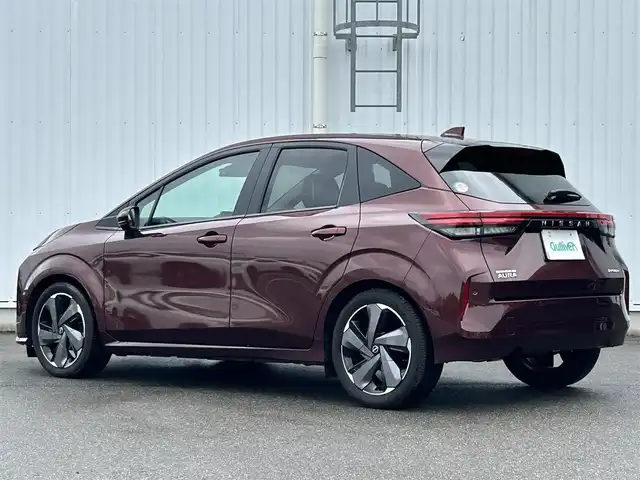 日産 オーラ G レザーエディション 愛媛県 2023(令5)年 1.4万km バーガンディー BOSEサウンド/アラウンドビューモニター/追従クルコン/前方ドラレコ/レザーシート/applecarplay/デジタルインナーミラー/C-TYPE充電/USB/ワイヤレス充電/前後コーナーセンサー/LED/オートライト/ビルトインETC2.0/純正ナビ/Bluetooth/フルセグTV/純正フロアマット/純正17インチアルミホイール