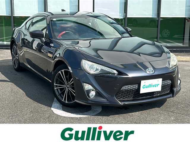 トヨタ ８６ GT 岐阜県 2013(平25)年 8.1万km ダークグレーメタリック 登録時走行距離：80716km/純正SDナビ/バックカメラ/Bluetooth・ワンセグテレビ/コンビステアリング/HIDヘッドライト/オートライト/横滑り防止装置/エアバッグ運転席・助手席/ドライブレコーダー前後/プッシュスタート/スマートキー/スペアキー1本/ETC/純正17インチアルミホイール/純正フロアマット