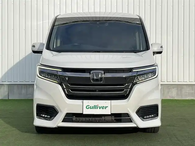 ホンダ ステップワゴン スパーダ クルスピセンシング 香川県 2018(平30)年 9万km プラチナホワイトパール 登録時走行距離：89205km/純正10型ナビ/　CD DVD BT フルセグTV/全方位カメラ/両側パワースライドドア/ホンダセンシング/レーダークルーズコントロール/レーンキープアシスト/LEDヘッドライト/オートライト/フォグランプ/横滑り防止装置/アイドリングストップ/ビルトインETC/純正前方ドライブレコーダー/ハーフレザーシート/シートヒーター/革巻きステアリング/ステアリングスイッチ/パドルシフト/プッシュスタート/スマートキー/スペアキー/新車時保証書/ワンオーナー