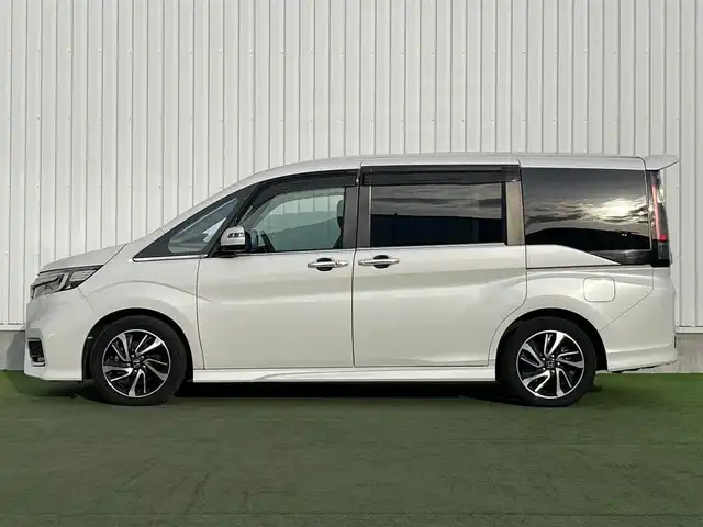 ホンダ ステップワゴン スパーダ クルスピセンシング 香川県 2018(平30)年 9万km プラチナホワイトパール 登録時走行距離：89205km/純正10型ナビ/　CD DVD BT フルセグTV/全方位カメラ/両側パワースライドドア/ホンダセンシング/レーダークルーズコントロール/レーンキープアシスト/LEDヘッドライト/オートライト/フォグランプ/横滑り防止装置/アイドリングストップ/ビルトインETC/純正前方ドライブレコーダー/ハーフレザーシート/シートヒーター/革巻きステアリング/ステアリングスイッチ/パドルシフト/プッシュスタート/スマートキー/スペアキー/新車時保証書/ワンオーナー