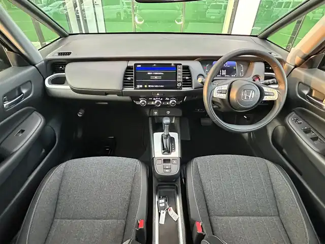 ホンダ フィット e:HEVホーム 和歌山県 2021(令3)年 3.5万km クリスタルブラックパール 純正コネクトナビ/フルセグTV/（BT/CD/DVD/USB)/バックカメラ/衝突被害軽減ブレーキ/踏み間違い防止/横滑り防止/レーダークルーズコントロール/前後コーナーセンサー/オートライト/ビルトインETC/前後ドライブレコーダー/ステアリングリモコン/LEDヘッドライト/ヘッドライトレベライザー/ハーフレザーシート/プッシュスタート/電格ミラー/純正フロアマット/ドアバイザー