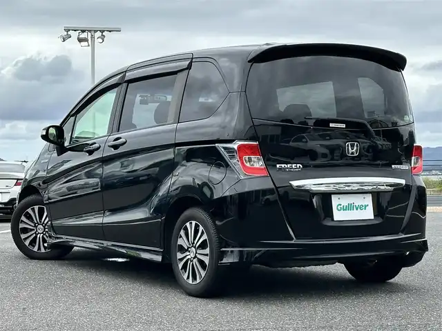 ホンダ フリード ハイブリット ジャストセレクション 島根県 2014(平26)年 7.4万km プレミアムスパークルブラックパール 登録時走行距離73/789Km/両側パワースライドドア/クルーズコントロール/純正メモリナビ【VXM-155VSi】/(DVD/ワンセグTV/Bluetooth)/ステアリングスイッチ/バックカメラ/ビルトインETC/前方ドライブレコーダー/横滑り防止機能/スマートキー/HIDヘッドライト/ウィンカーミラー/スタッドレスタイヤ積込/新車時保証書/取扱説明書