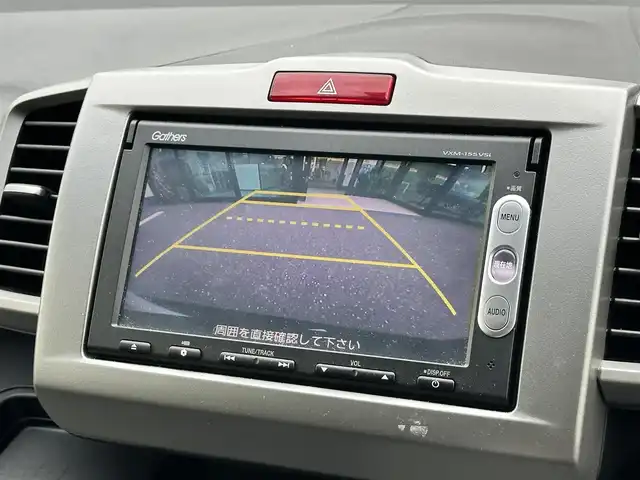 ホンダ フリード ハイブリット ジャストセレクション 島根県 2014(平26)年 7.4万km プレミアムスパークルブラックパール 登録時走行距離73/789Km/両側パワースライドドア/クルーズコントロール/純正メモリナビ【VXM-155VSi】/(DVD/ワンセグTV/Bluetooth)/ステアリングスイッチ/バックカメラ/ビルトインETC/前方ドライブレコーダー/横滑り防止機能/スマートキー/HIDヘッドライト/ウィンカーミラー/スタッドレスタイヤ積込/新車時保証書/取扱説明書