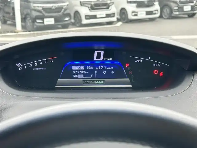ホンダ フリード ハイブリット ジャストセレクション 島根県 2014(平26)年 7.4万km プレミアムスパークルブラックパール 登録時走行距離73/789Km/両側パワースライドドア/クルーズコントロール/純正メモリナビ【VXM-155VSi】/(DVD/ワンセグTV/Bluetooth)/ステアリングスイッチ/バックカメラ/ビルトインETC/前方ドライブレコーダー/横滑り防止機能/スマートキー/HIDヘッドライト/ウィンカーミラー/スタッドレスタイヤ積込/新車時保証書/取扱説明書