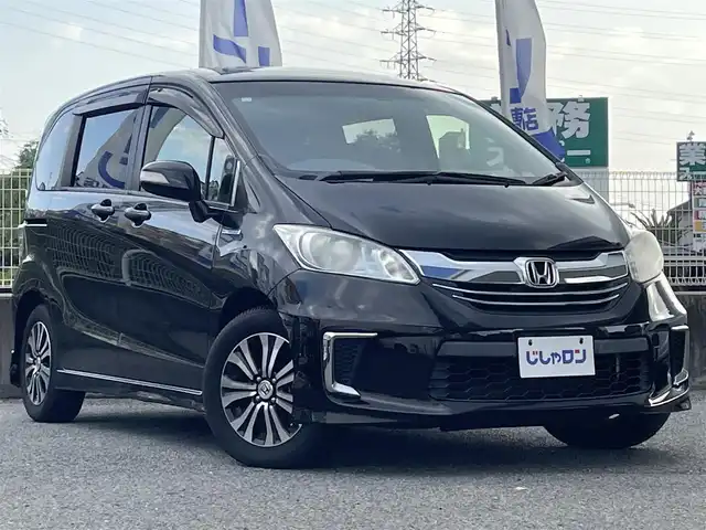 ホンダ フリード ハイブリット ジャストセレクション 兵庫県 2014(平26)年 7.4万km プレミアムスパークルブラックパール (株)IDOMが運営する【じしゃロン神戸名谷店】の自社ローン専用車両になりますこちらは現金またはオートローンご利用時の価格です。自社ローンご希望の方は別途その旨お申付け下さい。/両側パワースライドドア/クルーズコントロール/純正メモリナビ【VXM-155VSi】/(DVD/ワンセグTV/Bluetooth)/ステアリングスイッチ/バックカメラ/ビルトインETC/前方ドライブレコーダー/横滑り防止機能/スマートキー/HIDヘッドライト/ウィンカーミラー/スタッドレスタイヤ積込/新車時保証書/取扱説明書