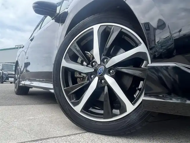 スバル レヴォーグ 1．8GT－H EX 愛媛県 2021(令3)年 7.2万km クリスタルブラックシリカ 登録時走行距離：71700km/メーカーOP純正ナビ/AM/FM/フルセグTV/ビルトインETC/バックサイドカメラ/電子ミラー/パドルシフト/追従クルコン/レーンキープアシスト/パーキングアシスト/衝突軽減システム/横滑り防止装置/電動リアゲート/エアロ/シートメモリー/LEDヘッドライト/オートライト/エンジンスタートボタン/スマートキー/純正アルミホイール