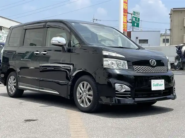 トヨタ ヴォクシー ZS 煌Ⅱ 千葉県 2012(平24)年 8万km ブラック 純正8インチSDナビ/Bluetooth/バックカメラ/フルセグTV/CD・DVD再生/AM・FMラジオ/ETC/両側パワースライドドア/純正後席モニター/純正16インチアルミホイール/LEDヘッドライト/プッシュスタート/スマートキー/スペアキー/取扱説明書＆保証書