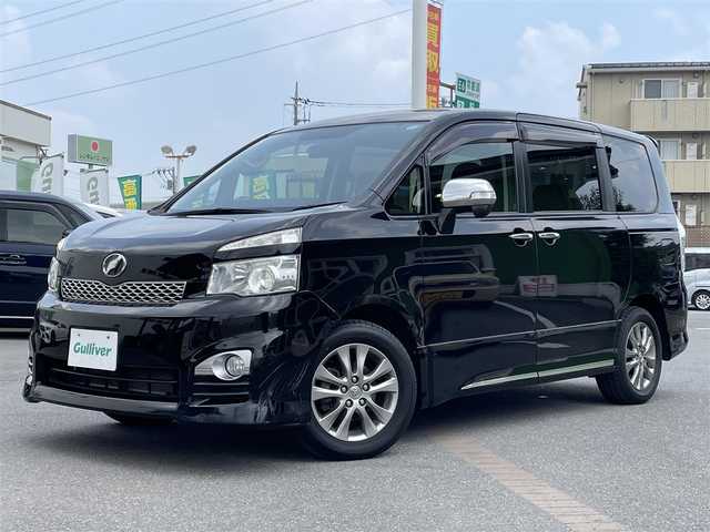 トヨタ ヴォクシー ZS 煌Ⅱ 千葉県 2012(平24)年 8万km ブラック 純正8インチSDナビ/Bluetooth/バックカメラ/フルセグTV/CD・DVD再生/AM・FMラジオ/ETC/両側パワースライドドア/純正後席モニター/純正16インチアルミホイール/LEDヘッドライト/プッシュスタート/スマートキー/スペアキー/取扱説明書＆保証書