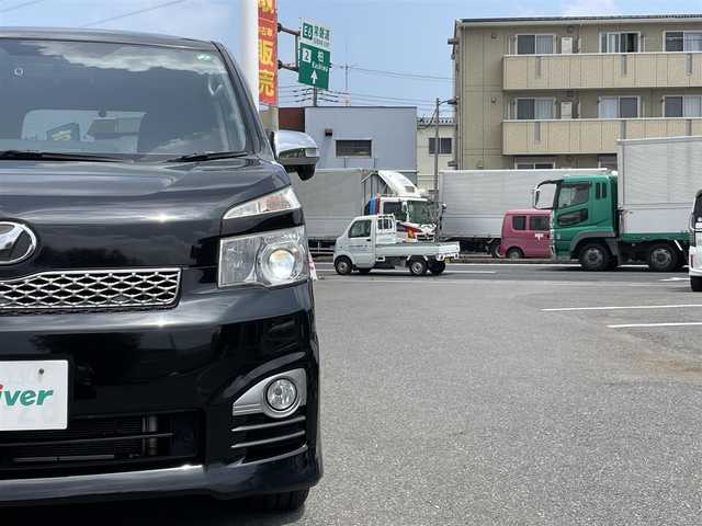 トヨタ ヴォクシー ZS 煌Ⅱ 千葉県 2012(平24)年 8万km ブラック 純正8インチSDナビ/Bluetooth/バックカメラ/フルセグTV/CD・DVD再生/AM・FMラジオ/ETC/両側パワースライドドア/純正後席モニター/純正16インチアルミホイール/LEDヘッドライト/プッシュスタート/スマートキー/スペアキー/取扱説明書＆保証書