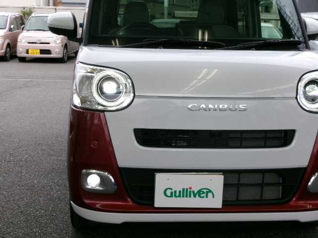 ダイハツ ムーヴ キャンバス ストライプス G 岡山県 2022(令4)年 0.7万km シャイニングホワイトパール/ファイアークォーツレッドメタリック 【 Smart Assist 】/ワンオーナー/純正9インチディスプレイオーディオ/フルセグテレビ/フロント・サイド・バックカメラ/パノラマモニター/Bluetooth/USB/HDMI/両側パワースライドドア/オートライト/フロントソナー・リアソナー/シートヒーター（前席）/スマートキー2個/ETC/純正LED/純正フロアマット/スマートキー2個