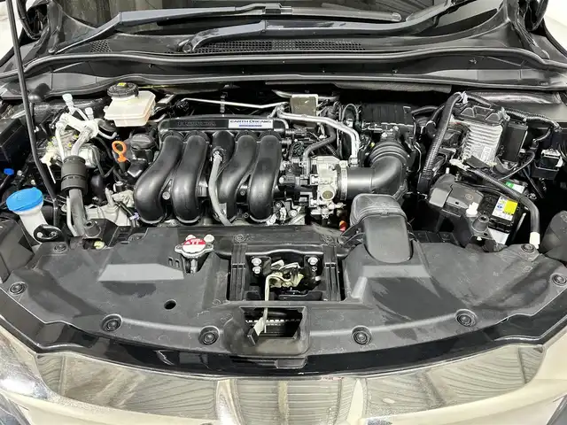 ホンダ ヴェゼル ハイブリッド Z ホンダセンシング 佐賀県 2020(令2)年 2.9万km ルーセブラックM 純正７インチナビ/（フルセグTV/CD/DVD/Bluetooth//USB/SD録音）/バックカメラ/衝突被害軽減ブレーキ/レーンキープアシスト/シートヒーター/ハーフレザーシート/パドルシフト/レーダークルーズコントロール/純正１７インチアルミホイール/ＬＥＤヘッドライト/オートライト/フォグライト/純正フロアマット/ビルトインＥＴＣ/スマートキー/スペアキー×１/電子パーキングブレーキ/ステアリングリモコン/横滑り防止装置/盗難防止装置