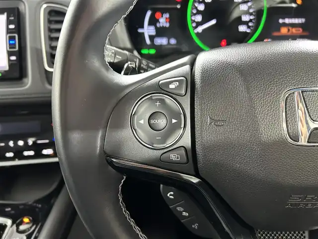 ホンダ ヴェゼル ハイブリッド Z ホンダセンシング 佐賀県 2020(令2)年 2.9万km ルーセブラックM 純正７インチナビ/（フルセグTV/CD/DVD/Bluetooth//USB/SD録音）/バックカメラ/衝突被害軽減ブレーキ/レーンキープアシスト/シートヒーター/ハーフレザーシート/パドルシフト/レーダークルーズコントロール/純正１７インチアルミホイール/ＬＥＤヘッドライト/オートライト/フォグライト/純正フロアマット/ビルトインＥＴＣ/スマートキー/スペアキー×１/電子パーキングブレーキ/ステアリングリモコン/横滑り防止装置/盗難防止装置