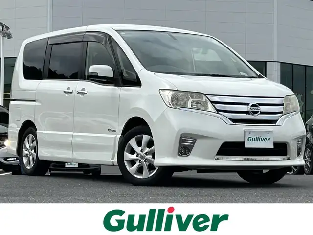 日産 セレナ ハイウェイS G Sハイブリッド 島根県 2013(平25)年 6.8万km ブリリアントホワイトパール 純正ナビ(MC312D-W)/(AM/FM/CD/DVD/Bluetooth)/クルーズコントロール/バックカメラ/片側パワースライドドア/ビルトインETC/後席サンシェード/スマートキー/スペアキー×1/プッシュスタート/純正16インチアルミホイール/純正フロアマット/取扱説明書/保証書