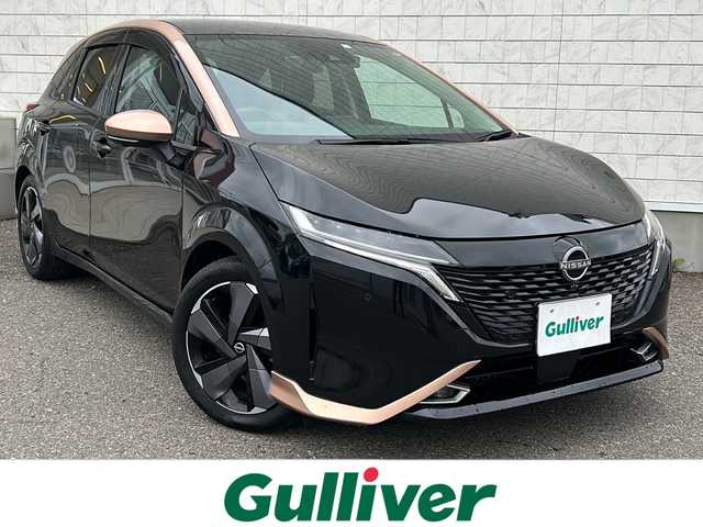 日産 オーラ G FOUR レザーエディション 福島県 2023(令5)年 4.7万km ミッドナイトブラック/サンライズカッパー 日産コネクトナビ　全周囲Ｃ　プロパイロット　ＢＯＳＥパーソナルサウンド　デジタルミラー　フルセグ　ＦＲエアロ　ドラレコ　ＨＤＭＩ　黒革シートヒーター　Ｑｉ充電　ステアヒーター　積込スタッドレス付ＡＷ