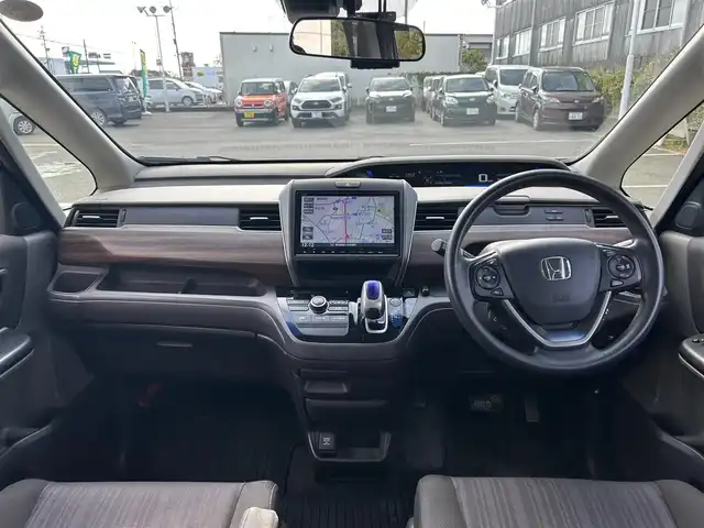 ホンダ フリード ハイブリット G ホンダセンシング 愛知県 2017(平29)年 9.7万km クリスタルブラックパール /純正9インチメモリナビ(VXM-175VFNi)/(フルセグTV/Bluetooth/DISC/SD)//ホンダセンシング//レーダークルーズコントロール//レーンキープアシスト//衝突軽減ブレーキ//バックカメラ//前後ドライブレコーダー(ZDR-015)//両側パワースライドドア//ビルトインＥＴＣ//スマートキー//ＬＥＤヘッドライト//スペアキーx1