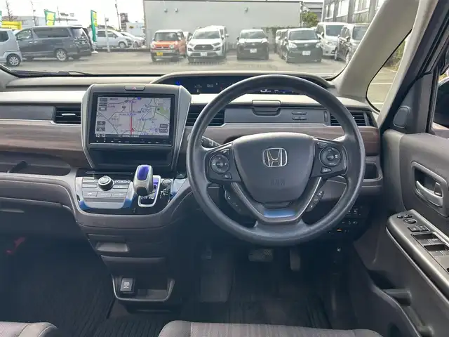 ホンダ フリード ハイブリット G ホンダセンシング 愛知県 2017(平29)年 9.7万km クリスタルブラックパール /純正9インチメモリナビ(VXM-175VFNi)/(フルセグTV/Bluetooth/DISC/SD)//ホンダセンシング//レーダークルーズコントロール//レーンキープアシスト//衝突軽減ブレーキ//バックカメラ//前後ドライブレコーダー(ZDR-015)//両側パワースライドドア//ビルトインＥＴＣ//スマートキー//ＬＥＤヘッドライト//スペアキーx1