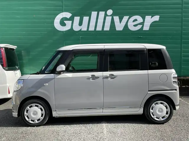 ダイハツ ムーヴ キャンバス G メイクアップ リミテッド　SAⅢ 東京都 2020(令2)年 2.7万km パールホワイトⅢ/スムースグレーマイカメタリック 2トーン ストライプスカラー/・ボディ色スムースグレーマイカメタリックツートーン/全方位カメラ/純正メモリナビ(NMZK-W72D)/(Bluetooth/フルセグTV/CD/DVD/USB/ipod)/前後方ドライブレコーダー(DRV-MR760)/両側パワースライドドア/寒冷地仕様/スマートアシスト/・衝突回避支援ブレーキ機能/・衝突警報機能/・車線逸脱警報機能/・誤発進抑制制御機能/・先行車発進お知らせ機能/・オートハイビーム/LEDヘッドランプ/アイドリングストップ/オートライト/オートエアコン/ETC/純正フロアマット/コーナーセンサー/保証書/取扱説明書/スペアキー