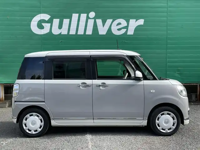 ダイハツ ムーヴ キャンバス G メイクアップ リミテッド　SAⅢ 東京都 2020(令2)年 2.7万km パールホワイトⅢ/スムースグレーマイカメタリック 2トーン ストライプスカラー/・ボディ色スムースグレーマイカメタリックツートーン/全方位カメラ/純正メモリナビ(NMZK-W72D)/(Bluetooth/フルセグTV/CD/DVD/USB/ipod)/前後方ドライブレコーダー(DRV-MR760)/両側パワースライドドア/寒冷地仕様/スマートアシスト/・衝突回避支援ブレーキ機能/・衝突警報機能/・車線逸脱警報機能/・誤発進抑制制御機能/・先行車発進お知らせ機能/・オートハイビーム/LEDヘッドランプ/アイドリングストップ/オートライト/オートエアコン/ETC/純正フロアマット/コーナーセンサー/保証書/取扱説明書/スペアキー