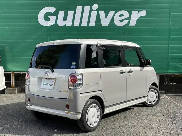 ダイハツ ムーヴ キャンバス G メイクアップ リミテッド　SAⅢ 東京都 2020(令2)年 2.7万km パールホワイトⅢ/スムースグレーマイカメタリック 2トーン ストライプスカラー/・ボディ色スムースグレーマイカメタリックツートーン/全方位カメラ/純正メモリナビ(NMZK-W72D)/(Bluetooth/フルセグTV/CD/DVD/USB/ipod)/前後方ドライブレコーダー(DRV-MR760)/両側パワースライドドア/寒冷地仕様/スマートアシスト/・衝突回避支援ブレーキ機能/・衝突警報機能/・車線逸脱警報機能/・誤発進抑制制御機能/・先行車発進お知らせ機能/・オートハイビーム/LEDヘッドランプ/アイドリングストップ/オートライト/オートエアコン/ETC/純正フロアマット/コーナーセンサー/保証書/取扱説明書/スペアキー