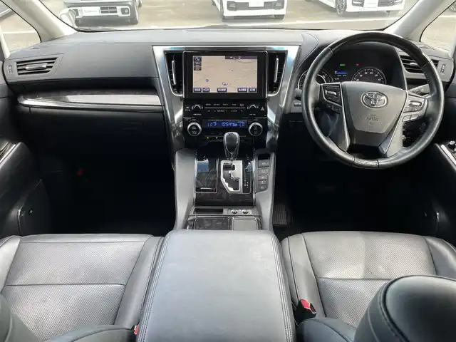 トヨタ アルファードハイブリット SR Cパッケージ 群馬県 2019(令1)年 6.2万km ホワイトパールクリスタルシャイン ワンオーナー/メーカーオプションナビ/CD/DVD/BTオーディオ/SD/USB/AUX/MSV/HDMI/フルセグTV/JBLプレミアムサウンドシステム/ツインムーンルーフ/Toyota Safety Sense/・PCS(プリクラッシュセーフティ)/・LTA(レーントレーシングアシスト)/・オートマチックハイビーム/・レーダークルーズコントロール/バックカメラ/パワーバックドア/両側パワースライドドア/純正フリップダウンモニター/ビルトインETC　Ver2.0/レザーシート/パワーシート(運転席/助手席)/メモリーシート(運転席)/シートヒータ(全席)/エアーシート(運転席/助手席)/ステアリングヒーター/オットマン/プッシュスタート/スマートキー/スペアキー1本/純正17インチアルミホイール