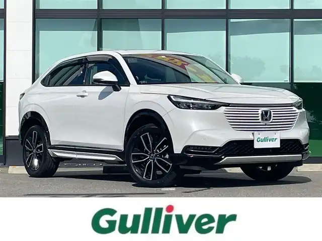 ホンダ ヴェゼル ハイブリッド e:HEV Z 和歌山県 2023(令5)年 1.1万km プラチナホワイトパール 純正9インチナビ/全方位カメラ/フルセグTV/BT/衝突軽減ブレーキ/レーダークルコン/前後コーナーセンサー/ブラインドスポットモニター/前後ドラレコ/レーダー探知機/ＥＴＣ/シートヒーター/ステアリングヒーター/ステアリングリモコン/ハイグレードスピーカーシステム/電動リアゲート/ＬＥＤヘッドライト/フォグランプ/オートホールド