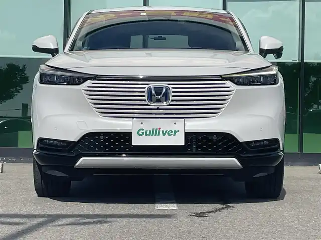 ホンダ ヴェゼル ハイブリッド e:HEV Z 和歌山県 2023(令5)年 1.1万km プラチナホワイトパール 純正9インチナビ/全方位カメラ/フルセグTV/BT/衝突軽減ブレーキ/レーダークルコン/前後コーナーセンサー/ブラインドスポットモニター/前後ドラレコ/レーダー探知機/ＥＴＣ/シートヒーター/ステアリングヒーター/ステアリングリモコン/ハイグレードスピーカーシステム/電動リアゲート/ＬＥＤヘッドライト/フォグランプ/オートホールド