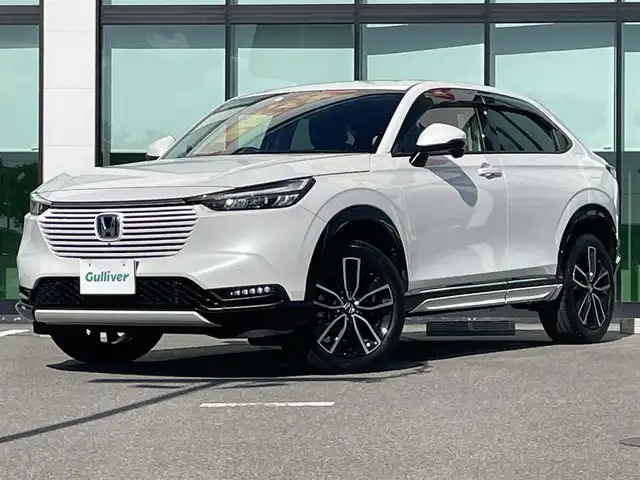 ホンダ ヴェゼル ハイブリッド e:HEV Z 和歌山県 2023(令5)年 1.1万km プラチナホワイトパール 純正9インチナビ/全方位カメラ/フルセグTV/BT/衝突軽減ブレーキ/レーダークルコン/前後コーナーセンサー/ブラインドスポットモニター/前後ドラレコ/レーダー探知機/ＥＴＣ/シートヒーター/ステアリングヒーター/ステアリングリモコン/ハイグレードスピーカーシステム/電動リアゲート/ＬＥＤヘッドライト/フォグランプ/オートホールド