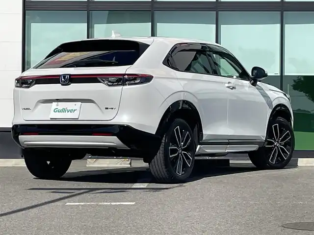 ホンダ ヴェゼル ハイブリッド e:HEV Z 和歌山県 2023(令5)年 1.1万km プラチナホワイトパール 純正9インチナビ/全方位カメラ/フルセグTV/BT/衝突軽減ブレーキ/レーダークルコン/前後コーナーセンサー/ブラインドスポットモニター/前後ドラレコ/レーダー探知機/ＥＴＣ/シートヒーター/ステアリングヒーター/ステアリングリモコン/ハイグレードスピーカーシステム/電動リアゲート/ＬＥＤヘッドライト/フォグランプ/オートホールド