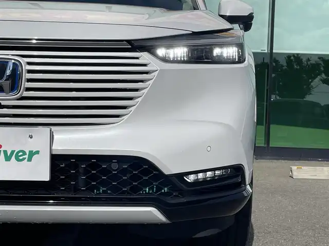 ホンダ ヴェゼル ハイブリッド e:HEV Z 和歌山県 2023(令5)年 1.1万km プラチナホワイトパール 純正9インチナビ/全方位カメラ/フルセグTV/BT/衝突軽減ブレーキ/レーダークルコン/前後コーナーセンサー/ブラインドスポットモニター/前後ドラレコ/レーダー探知機/ＥＴＣ/シートヒーター/ステアリングヒーター/ステアリングリモコン/ハイグレードスピーカーシステム/電動リアゲート/ＬＥＤヘッドライト/フォグランプ/オートホールド