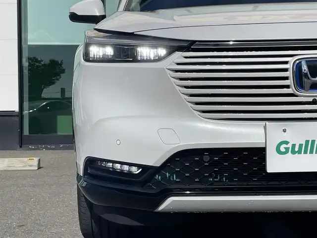 ホンダ ヴェゼル ハイブリッド e:HEV Z 和歌山県 2023(令5)年 1.1万km プラチナホワイトパール 純正9インチナビ/全方位カメラ/フルセグTV/BT/衝突軽減ブレーキ/レーダークルコン/前後コーナーセンサー/ブラインドスポットモニター/前後ドラレコ/レーダー探知機/ＥＴＣ/シートヒーター/ステアリングヒーター/ステアリングリモコン/ハイグレードスピーカーシステム/電動リアゲート/ＬＥＤヘッドライト/フォグランプ/オートホールド