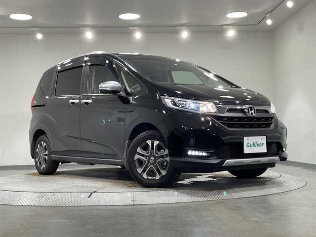 ホンダ フリード＋ ハイブリット クロスター 愛知県 2022(令4)年 7.8万km クリスタルブラックパール ワンオーナー/社外メモリナビ（AVIC-RL912）/・AM/FM/CD/DVD/Bluetooth/・フルセグテレビ/衝突軽減ブレーキ/レーンキープアシスト/追従付きクルーズコントロール/オートエアコン/オートライト/純正15インチアルミホイル/LEDヘッドライト/バックカメラ/クリアランスソナー/スマートキー/プッシュスタートボタン/スペアキー/シートヒーター（D席＋N席）/純正フロアマット/保証書/取扱説明書