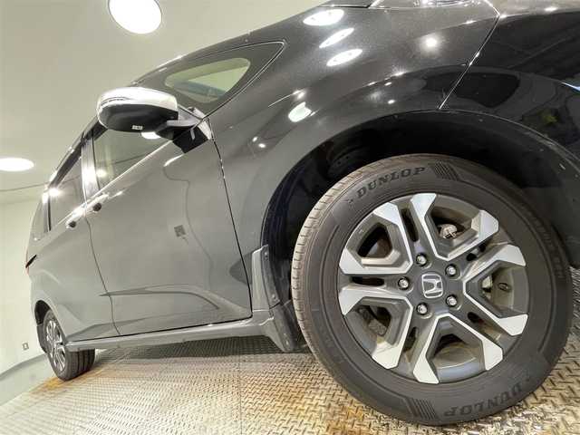 ホンダ フリード＋ ハイブリット クロスター 愛知県 2022(令4)年 7.8万km クリスタルブラックパール ワンオーナー/社外メモリナビ（AVIC-RL912）/・AM/FM/CD/DVD/Bluetooth/・フルセグテレビ/衝突軽減ブレーキ/レーンキープアシスト/追従付きクルーズコントロール/オートエアコン/オートライト/純正15インチアルミホイル/LEDヘッドライト/バックカメラ/クリアランスソナー/スマートキー/プッシュスタートボタン/スペアキー/シートヒーター（D席＋N席）/純正フロアマット/保証書/取扱説明書
