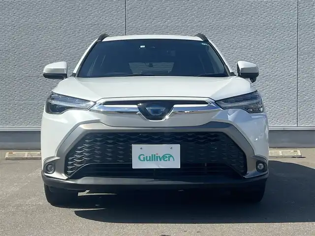 トヨタ カローラ クロス ハイブリッド Z 秋田県 2022(令4)年 7.1万km プラチナホワイトパールマイカ ４WD/衝突軽減システム/LEDヘッドライト/純正メモリナビ/フルセグ/バックカメラ/トヨタ純正18インチアルミ/スマートキー/アイドリングストップ/プッシュスタート/クルーズコントロール追従走行有/オートマチックハイビーム/レーンキープアシスト/コーナーセンサー/ステアリングスイッチ/電動パーキングブレーキ/ブレーキホールド機能/電動リアゲート/ドライブレコーダー/運転席パワーシート/前席シートヒーター/ETC/ルーフレール/純正フロアマット/純正ドアバイザー/オートライト/オートエアコン/パワーステアリング/パワーウィンドウ/ヘッドライトレベライザー/横滑り防止/盗難防止装置/寒冷地仕様/電動格納ウィンカーミラー/保証書/取扱説明書/記録簿/スペアキー1本有