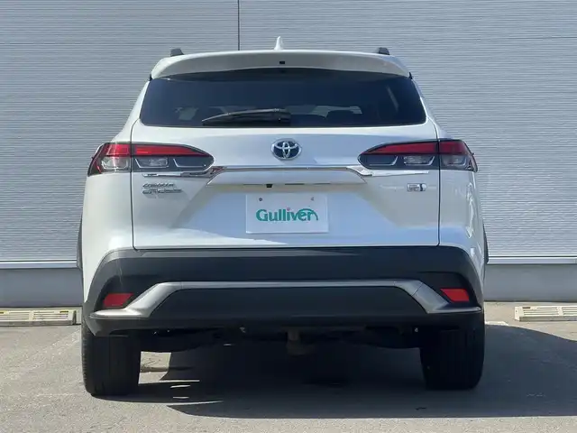 トヨタ カローラ クロス ハイブリッド Z 秋田県 2022(令4)年 7.1万km プラチナホワイトパールマイカ ４WD/衝突軽減システム/LEDヘッドライト/純正メモリナビ/フルセグ/バックカメラ/トヨタ純正18インチアルミ/スマートキー/アイドリングストップ/プッシュスタート/クルーズコントロール追従走行有/オートマチックハイビーム/レーンキープアシスト/コーナーセンサー/ステアリングスイッチ/電動パーキングブレーキ/ブレーキホールド機能/電動リアゲート/ドライブレコーダー/運転席パワーシート/前席シートヒーター/ETC/ルーフレール/純正フロアマット/純正ドアバイザー/オートライト/オートエアコン/パワーステアリング/パワーウィンドウ/ヘッドライトレベライザー/横滑り防止/盗難防止装置/寒冷地仕様/電動格納ウィンカーミラー/保証書/取扱説明書/記録簿/スペアキー1本有