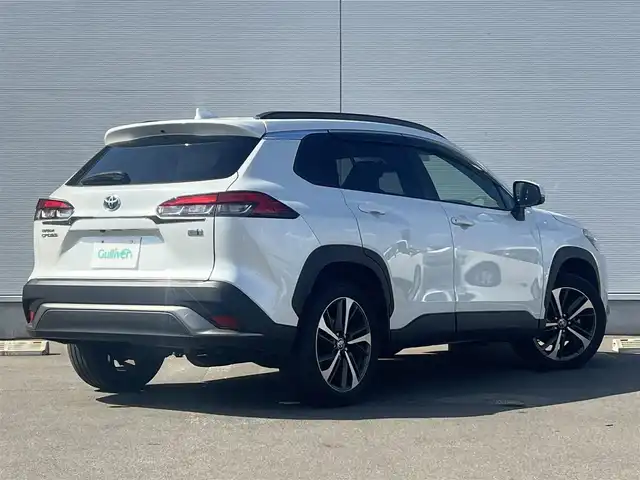 トヨタ カローラ クロス ハイブリッド Z 秋田県 2022(令4)年 7.1万km プラチナホワイトパールマイカ ４WD/衝突軽減システム/LEDヘッドライト/純正メモリナビ/フルセグ/バックカメラ/トヨタ純正18インチアルミ/スマートキー/アイドリングストップ/プッシュスタート/クルーズコントロール追従走行有/オートマチックハイビーム/レーンキープアシスト/コーナーセンサー/ステアリングスイッチ/電動パーキングブレーキ/ブレーキホールド機能/電動リアゲート/ドライブレコーダー/運転席パワーシート/前席シートヒーター/ETC/ルーフレール/純正フロアマット/純正ドアバイザー/オートライト/オートエアコン/パワーステアリング/パワーウィンドウ/ヘッドライトレベライザー/横滑り防止/盗難防止装置/寒冷地仕様/電動格納ウィンカーミラー/保証書/取扱説明書/記録簿/スペアキー1本有
