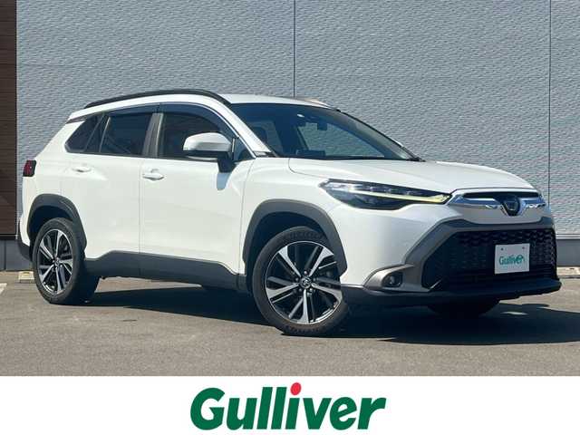 トヨタ カローラ クロス ハイブリッド Z 秋田県 2022(令4)年 7.1万km プラチナホワイトパールマイカ ４WD/衝突軽減システム/LEDヘッドライト/純正メモリナビ/フルセグ/バックカメラ/トヨタ純正18インチアルミ/スマートキー/アイドリングストップ/プッシュスタート/クルーズコントロール追従走行有/オートマチックハイビーム/レーンキープアシスト/コーナーセンサー/ステアリングスイッチ/電動パーキングブレーキ/ブレーキホールド機能/電動リアゲート/ドライブレコーダー/運転席パワーシート/前席シートヒーター/ETC/ルーフレール/純正フロアマット/純正ドアバイザー/オートライト/オートエアコン/パワーステアリング/パワーウィンドウ/ヘッドライトレベライザー/横滑り防止/盗難防止装置/寒冷地仕様/電動格納ウィンカーミラー/保証書/取扱説明書/記録簿/スペアキー1本有