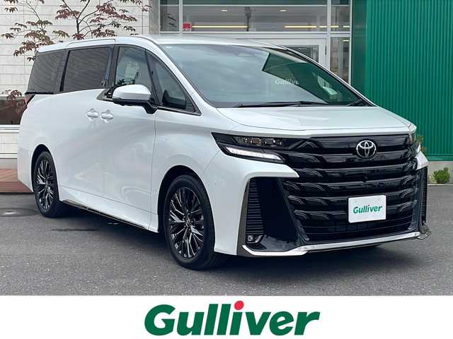 トヨタ ヴェルファイア Z プレミア 青森県 2025(令7)年 0.1万km プラチナホワイトパールマイカ 寒冷地仕様/14インチDオーディオナビ・フルセグTV/パノラミックビューモニター/左右独立ムーンルーフ/ブラウン革シート/エアシート・ヒーター/ステアリングヒーター/デジタルインナーミラー/後席パワーサンシェード/両側パワースライドドア/パワーバックドア/セーフティセンス/プリクラッシュセーフティ/レーダークルーズコントロール/レーンチェンジアシスト/レーントレーシングアシスト/アダプティブハイビーム/ブラインドスポットモニター/トヨタチームメイト/アドバンストパーク/3眼LEDヘッドランプ/LEDフォグランプ/純正19インチアルミ/スペアキー