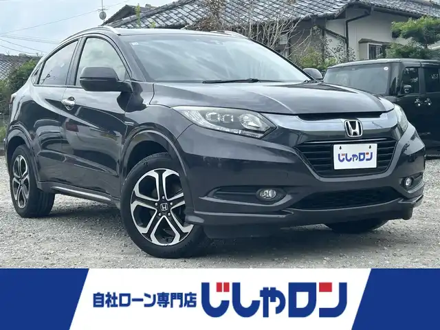 ホンダ ヴェゼル ハイブリッド Z 宮崎県 2014(平26)年 14.2万km ルーセブラックM /ナビ(VXM-152VFi)//TV/CD/DVD/Bluetooth//ETC//前席シートヒーター//バックカメラ//クルーズコントロール//BRAKE HOLD//純正フロアマット//純正アルミホイール//オートライト//パドルシフト//ステアリングスイッチ