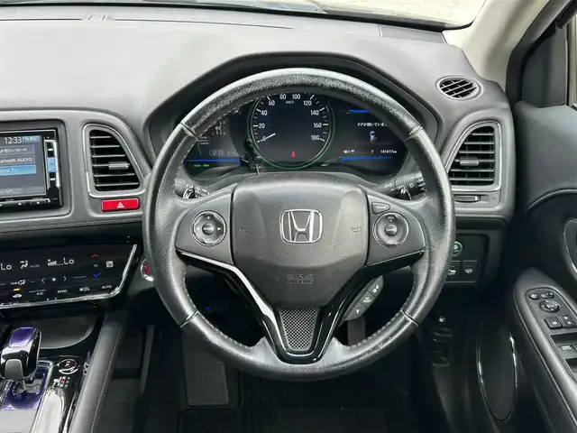 ホンダ ヴェゼル ハイブリッド Z 宮崎県 2014(平26)年 14.2万km ルーセブラックM /ナビ(VXM-152VFi)//TV/CD/DVD/Bluetooth//ETC//前席シートヒーター//バックカメラ//クルーズコントロール//BRAKE HOLD//純正フロアマット//純正アルミホイール//オートライト//パドルシフト//ステアリングスイッチ