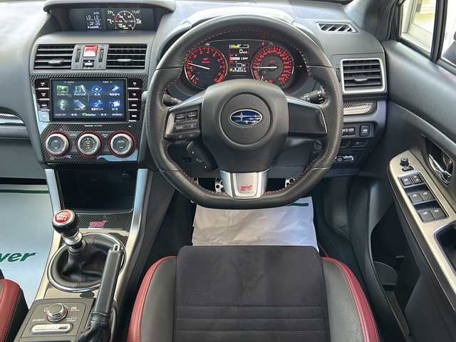 スバル ＷＲＸ ＳＴＩ STI 神奈川県 2014(平26)年 7.4万km ダークグレーメタリック 4WD/6速MT/純正ディーラーナビ(CD/DVD/SD/USB/フルセグTV)/バックカメラ/プッシュスタート/STIシート/STI18インチアルミ/ハーフレザーシート/D席パワーシート/ETC/横滑り防止装置/オートライト/フォグランプ/純正フロアマット/ドアバイザー/ステアリングスイッチ/電動格納ウィンカーミラー/ISOFIX/スペアキー×1/保証書/取扱説明書