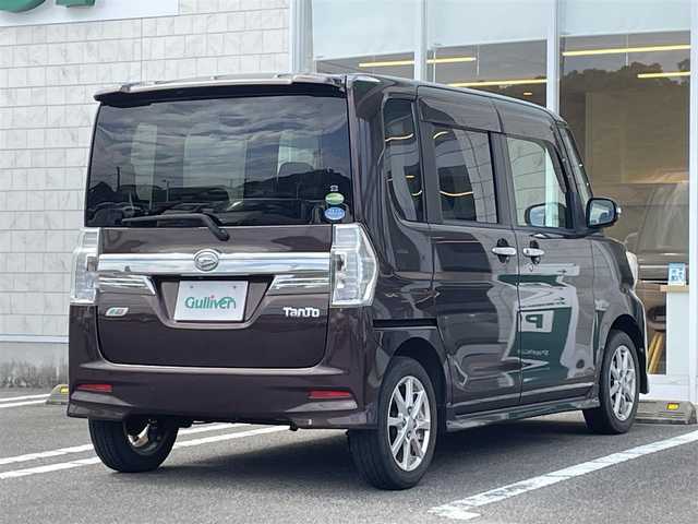 ダイハツ タント カスタム X SA 宮崎県 2014(平26)年 5.6万km プラムブラウンクリスタルマイカ 純正SDナビ/（CD/DVD/AM/FM/BT)/バックカメラ/フルセグTV/片側パワースライドドア/衝突防止機能/横滑り防止機能/アイドリングストップ/ステアリングストップ/ETC