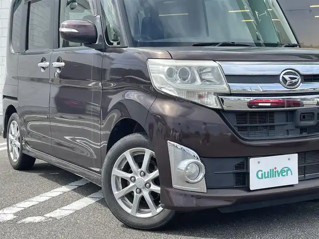 ダイハツ タント カスタム X SA 宮崎県 2014(平26)年 5.6万km プラムブラウンクリスタルマイカ 純正SDナビ/（CD/DVD/AM/FM/BT)/バックカメラ/フルセグTV/片側パワースライドドア/衝突防止機能/横滑り防止機能/アイドリングストップ/ステアリングストップ/ETC