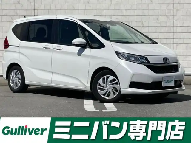 ホンダ フリード G ホンダセンシング 福岡県 2021(令3)年 2.3万km プラチナホワイトパール 純正7型SDナビ（フルセグTV/CD/DVD/BT）バックカメラホンダセンシングコーナーセンサーレーダークルコン両側パワスラETCUSBポート純正フロアマットスマートキープッシュスタート