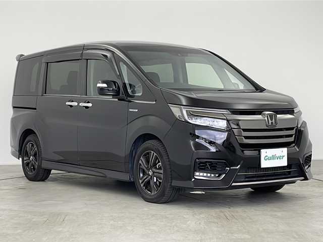 ホンダ ステップワゴン スパーダ ハイブリッドG EX HセンシングBスタイ 愛知県 2019(平31)年 6.8万km プレミアムスパークルブラックパール 純正ナビ/CD DVD BT フルセグTV HDMI/フリップダウンモニター/バックカメラ/両側パワースライドドア/シートヒーター/ホンダセンシング/LKA/ACC/衝突軽減ブレーキ/LEDヘッドライト/ETC/スマートキー