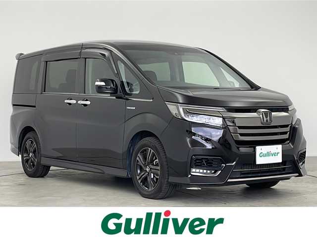 ホンダ ステップワゴン スパーダ ハイブリッドG EX HセンシングBスタイ 愛知県 2019(平31)年 6.8万km プレミアムスパークルブラックパール 純正ナビ/CD DVD BT フルセグTV HDMI/フリップダウンモニター/バックカメラ/両側パワースライドドア/シートヒーター/ホンダセンシング/LKA/ACC/衝突軽減ブレーキ/LEDヘッドライト/ETC/スマートキー