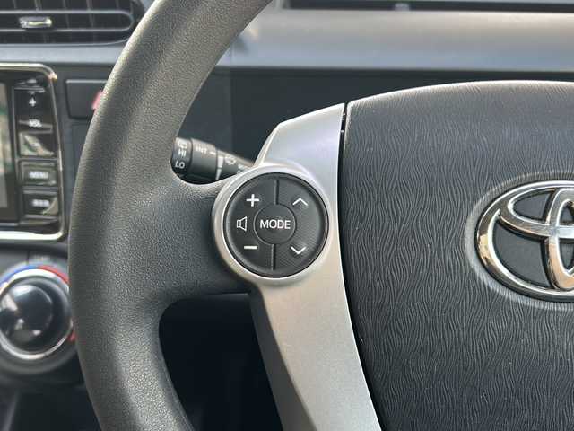 トヨタ アクア S 兵庫県 2013(平25)年 9.4万km ライムホワイトパールクリスタルシャイン 社外ナビ/CD/DVD/Bluetooth/フルセグTV/バックカメラ/OP/・スマートエントリーパッケージ/スマートエントリー/スタートシステムイモビライザー/オートライト/・ツーリングパッケージ/純正16インチAW/大型リアスポイラー/専用サスペンション/・LEDヘッドランプパッケージ/ブラック加飾付LEDヘッドランプ/ヘッドランプクリーナー/フロントフォグランプ/-/ETC/現状オールシーズンタイヤ装着/保証書/取説/スペアキー1本